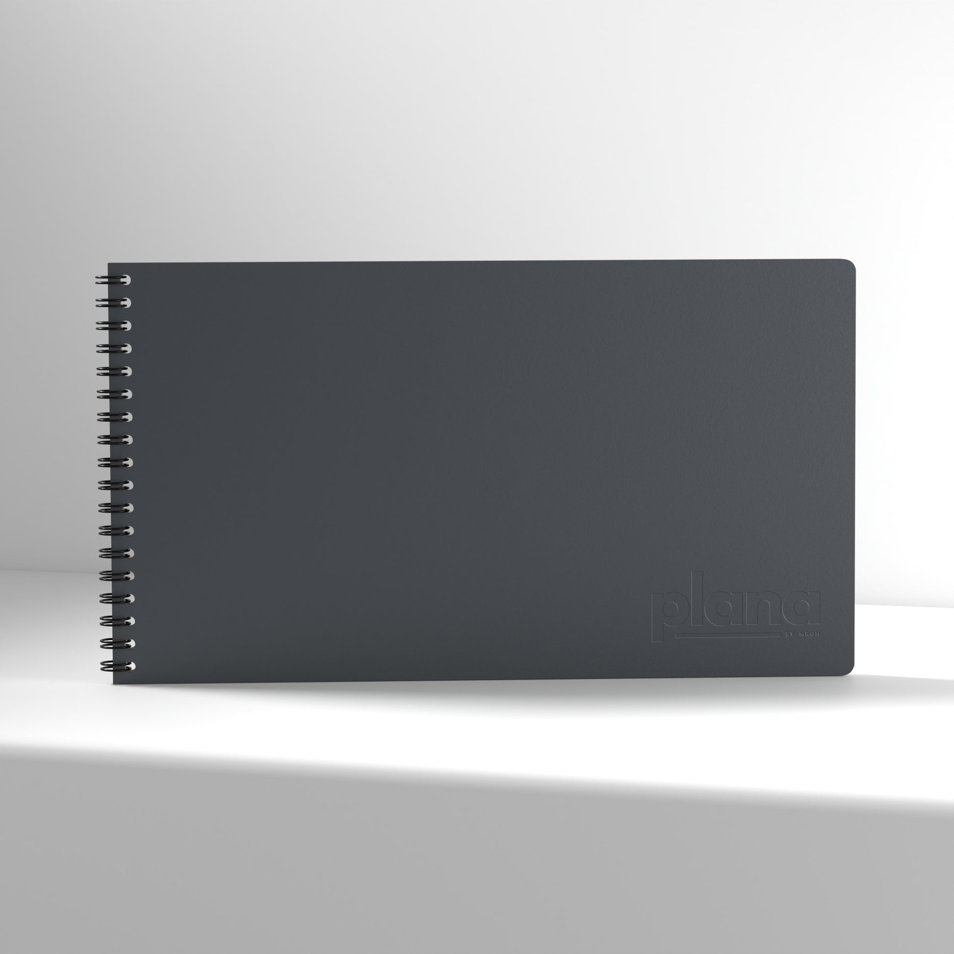 Plana Classic Stone notebook with a spiral binding on a white background