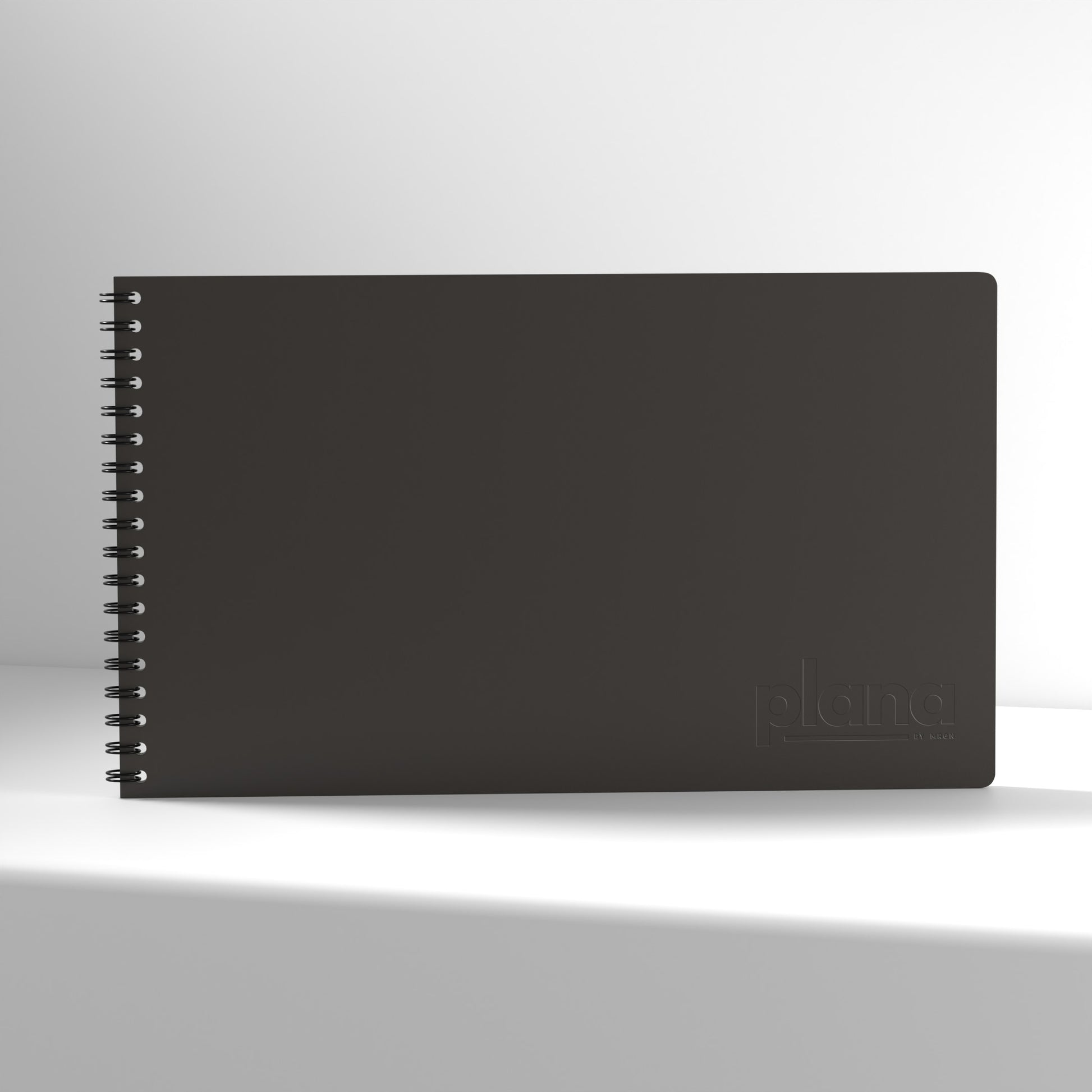 Plana Pro Graphite notebook with a spiral binding on a white background