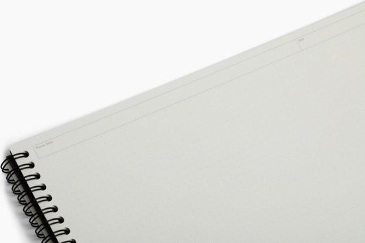 Inside pages of the Plana Pro notebook showcasing dedicated sections for Focus Area and Date on a white background