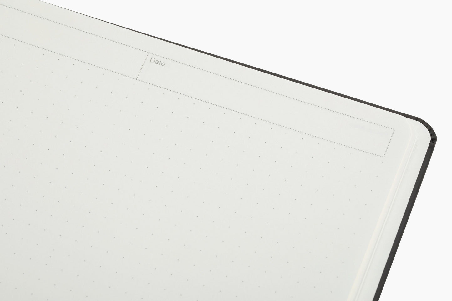 Inside pages of the Plana Pro notebook showcasing dedicated sections for Date on a white background