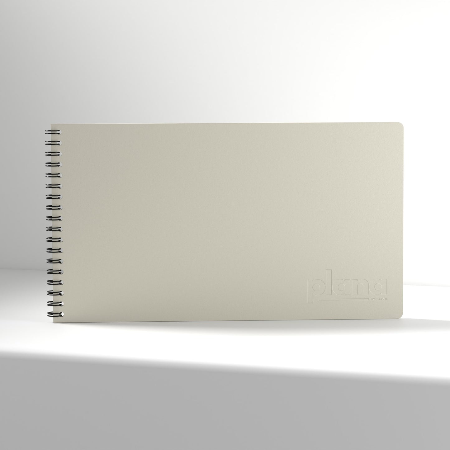 Plana Classic Fog notebook with a spiral binding on a white background