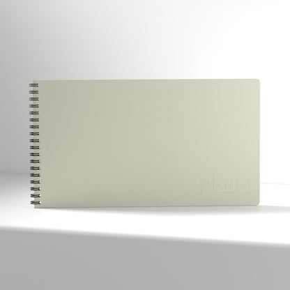 Plana Classic Fog notebook with a spiral binding on a white background