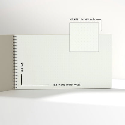 Plana Classic notebook with spiral binding and text on a white background