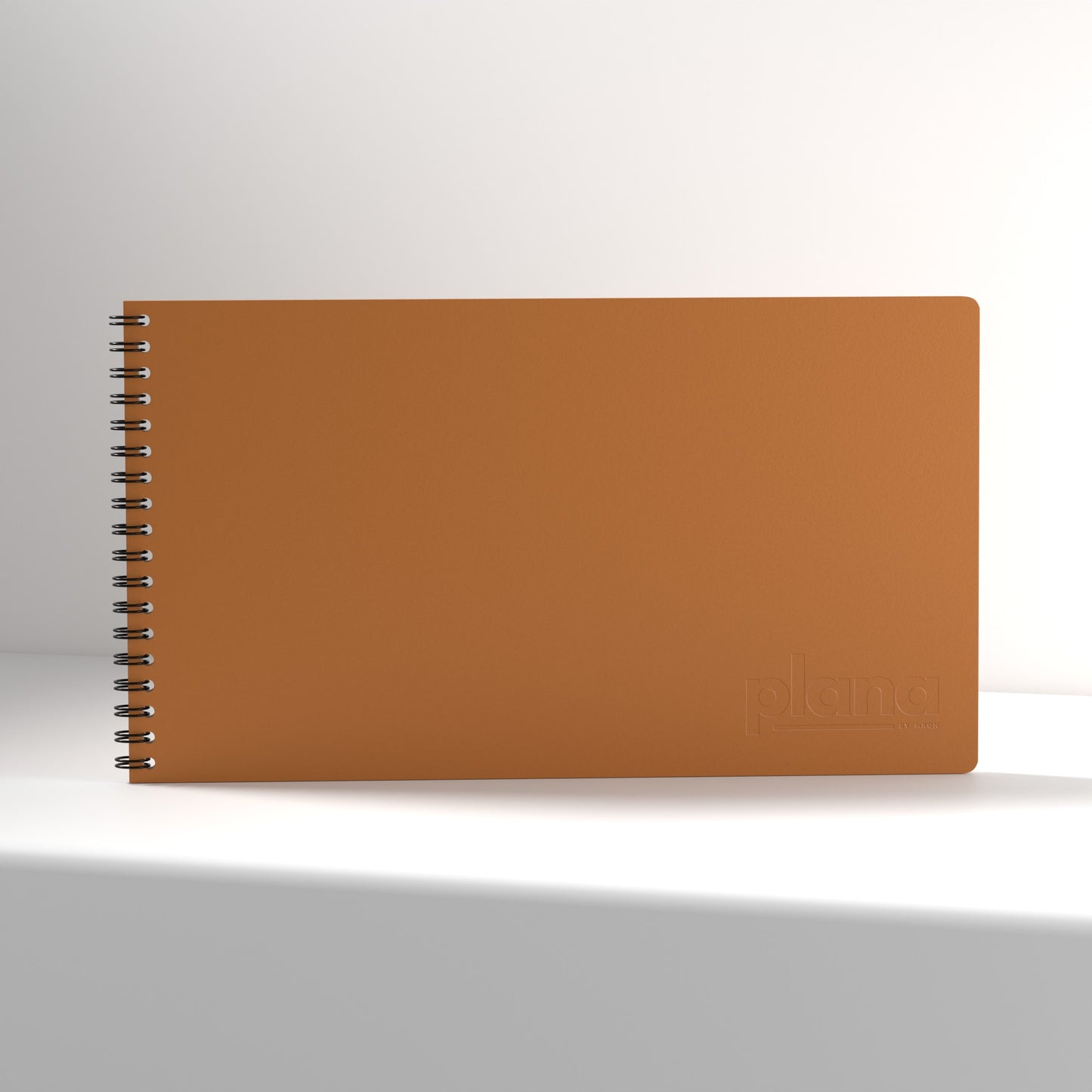 Plana Classic Spritz notebook with a spiral binding on a white background