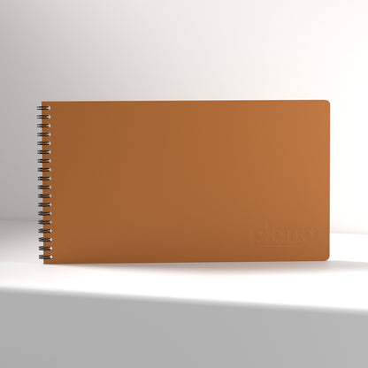 Plana Classic Spritz notebook with a spiral binding on a white background