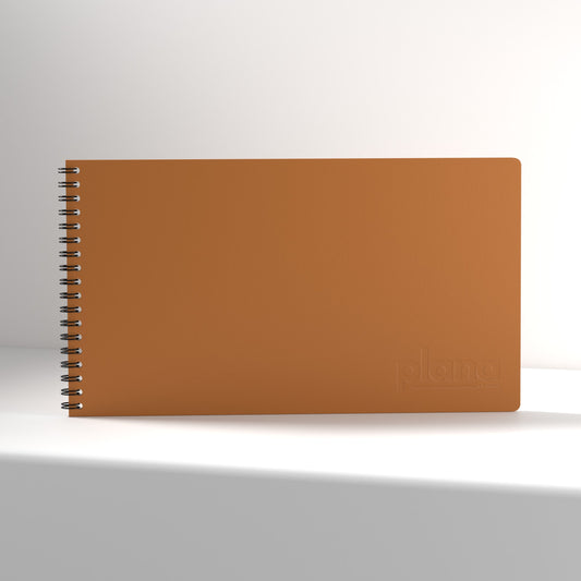 Plana Classic Spritz notebook with a spiral binding on a white background