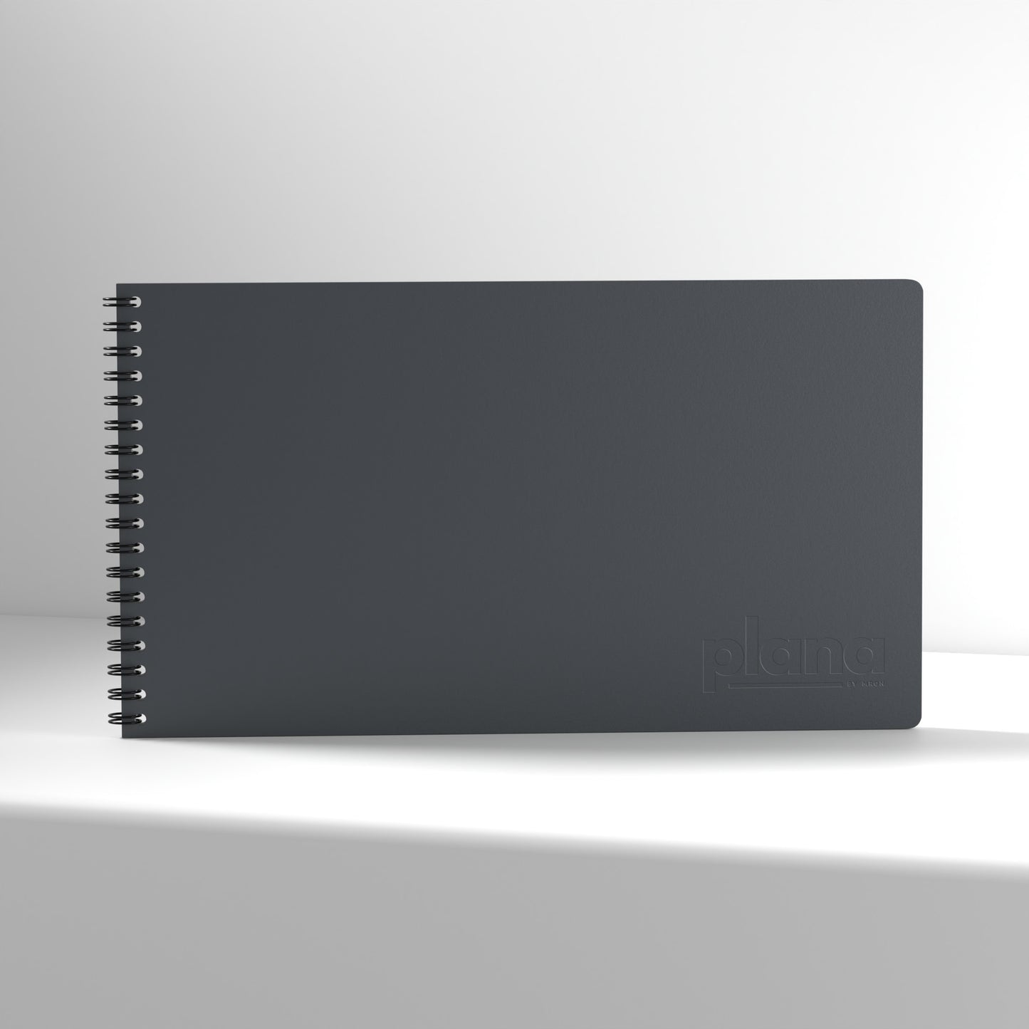 Plana Classic Stone notebook with a spiral binding on a white background