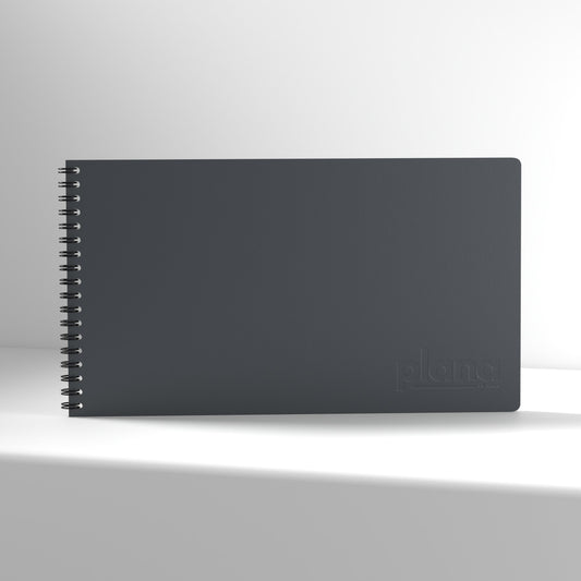 Plana Classic Stone notebook with a spiral binding on a white background