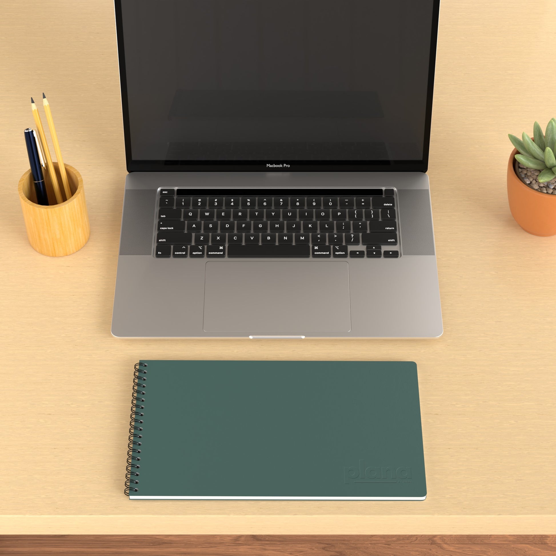 Plana Flex Hunter on a wooden desk with a laptop, pen holder, and plant