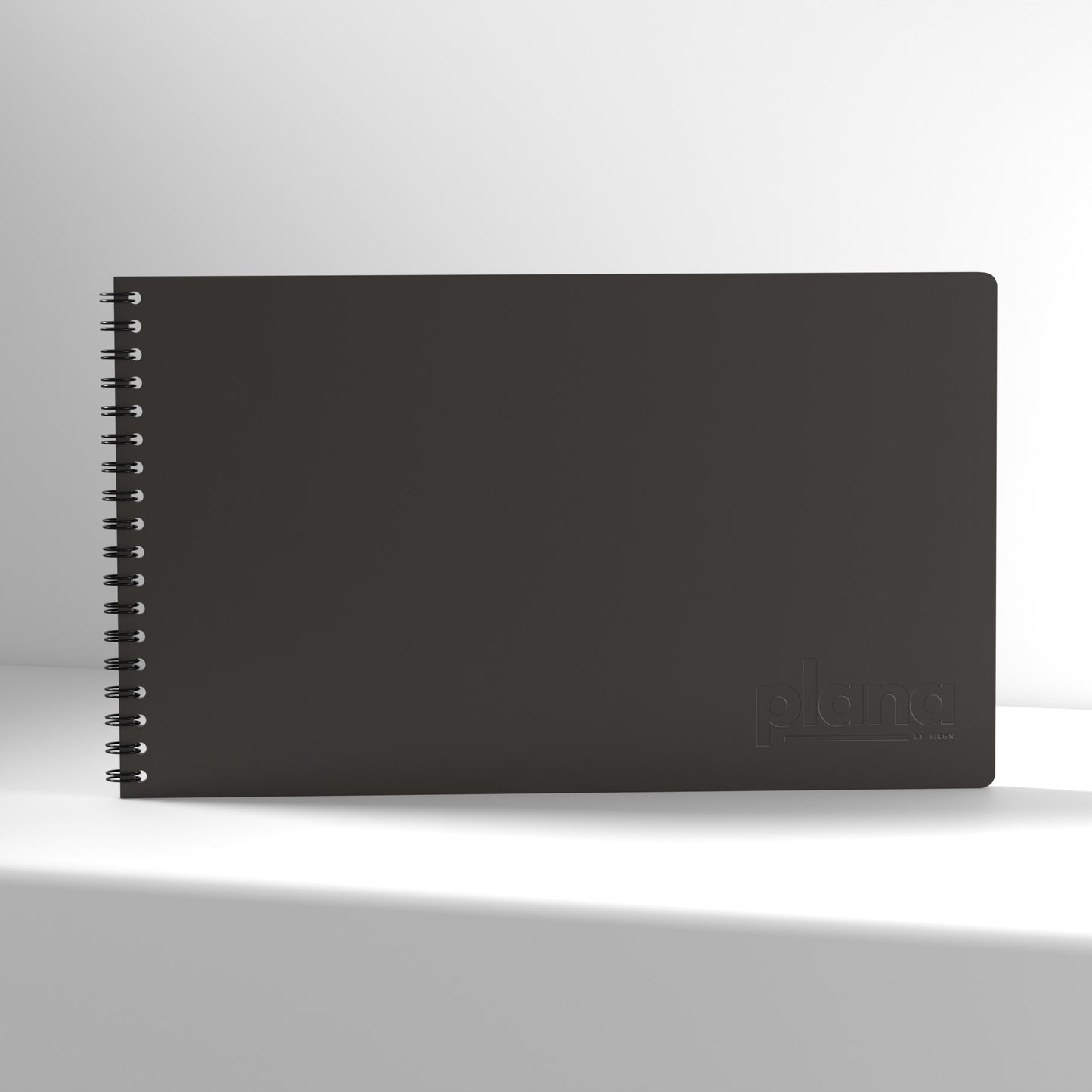 Plana Pro Graphite notebook with a spiral binding on a white background